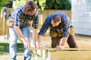 Building a Deck in Salem by 2 workers with tool belts