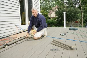 Salem Deck Installation with worker and tools