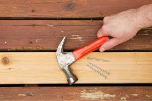 Salem Deck Repair with hammer and nails