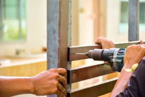 Salem Fence Repair workers fixing a fence