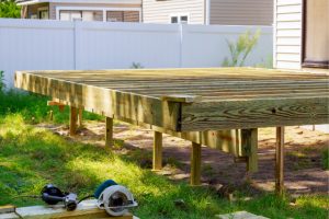 Salem New Deck Build with power tools on the ground