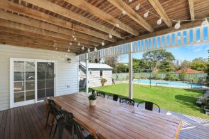 Salem residential backyard wooden deck and pergola